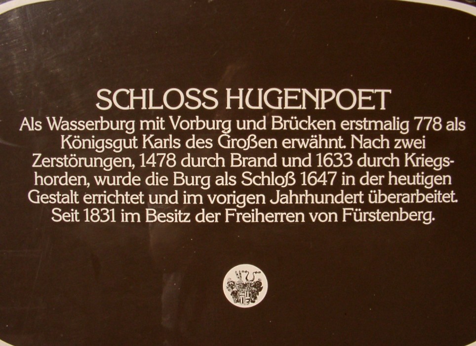 Wandtafel mit Beschreibung Schloss Hugenpoet